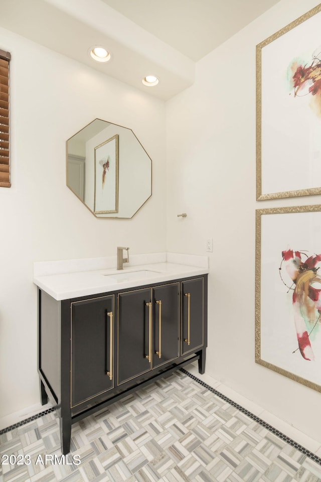 bathroom featuring vanity and parquet floors