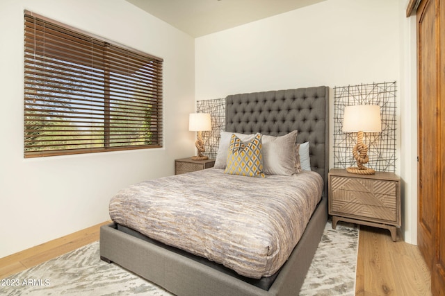 bedroom featuring light wood-type flooring