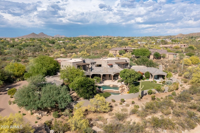 drone / aerial view featuring a mountain view