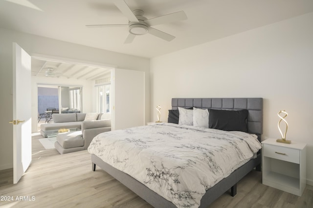 bedroom featuring light wood finished floors and ceiling fan