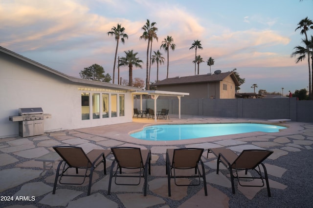 pool at dusk featuring a fenced in pool, a grill, fence, and a patio