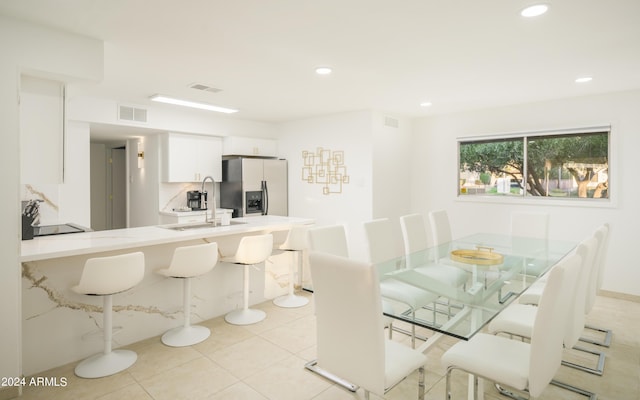 dining room featuring recessed lighting, visible vents, and light tile patterned floors