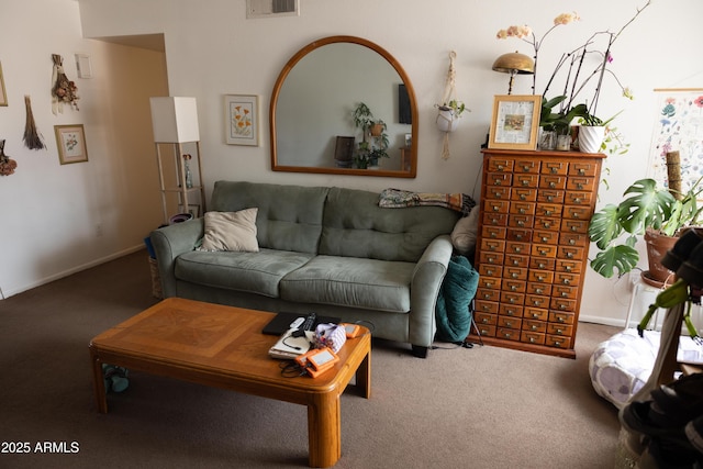 living room featuring visible vents, baseboards, and carpet floors