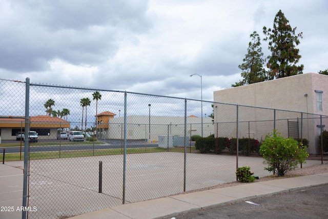 view of property's community with fence