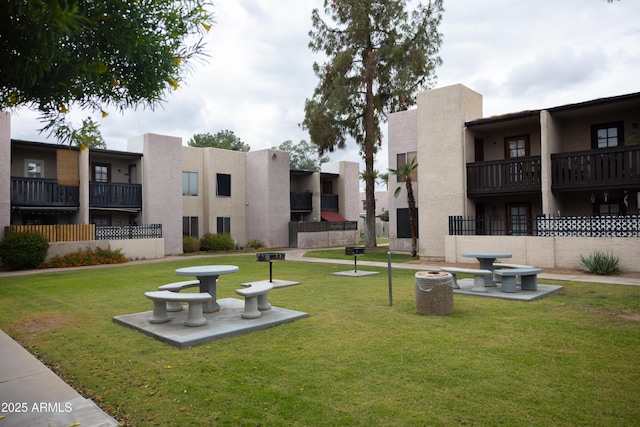 surrounding community with a lawn
