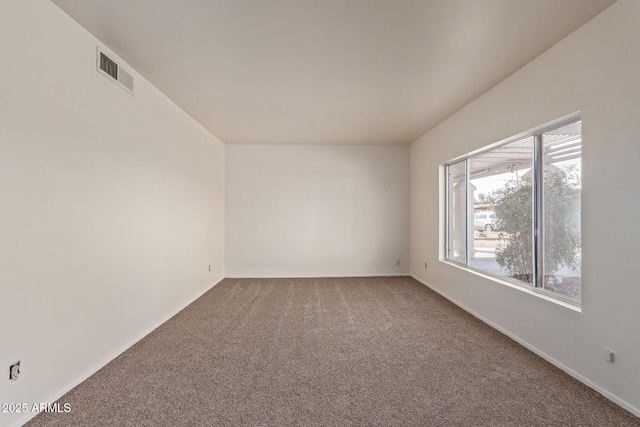 unfurnished room with carpet