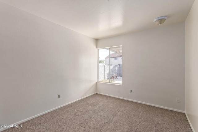 view of carpeted spare room