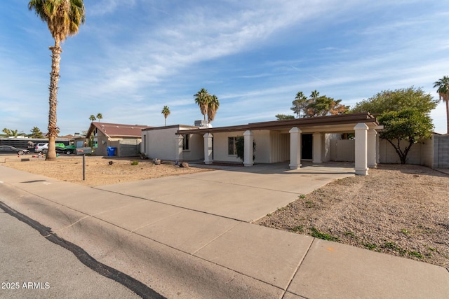 view of front facade featuring a carport