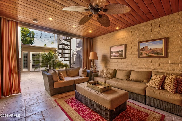 living room featuring wood ceiling and ceiling fan