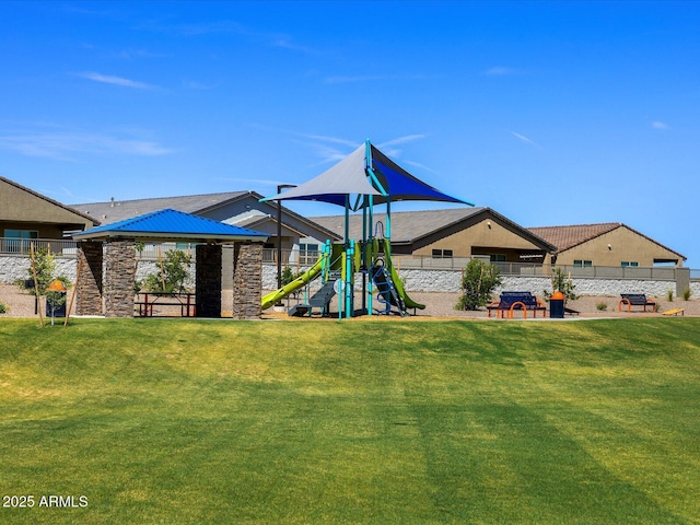 view of playground featuring a gazebo and a lawn