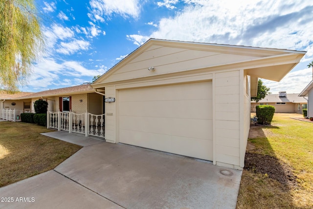 single story home with a front lawn and a garage