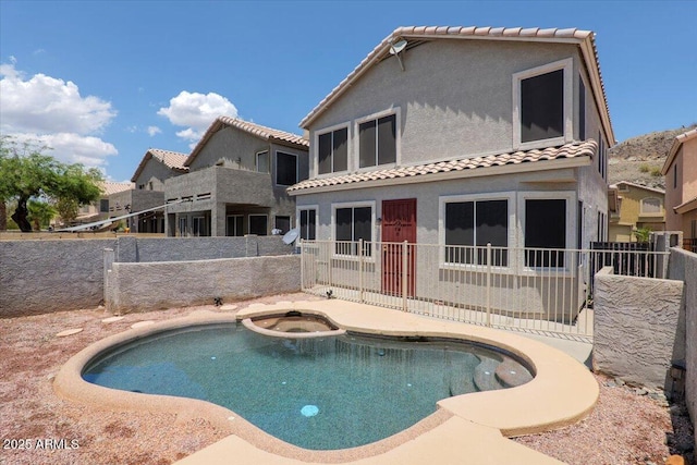 1453 E S Fork Dr, Phoenix, AZ 85048 - view of pool with a fenced backyard and a pool with connected hot tub