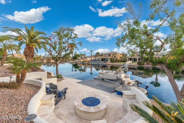 property view of water with a dock