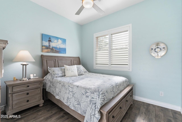 bedroom with ceiling fan and dark hardwood / wood-style floors