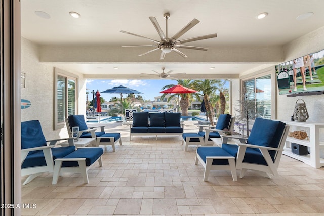 view of patio / terrace with outdoor lounge area and ceiling fan