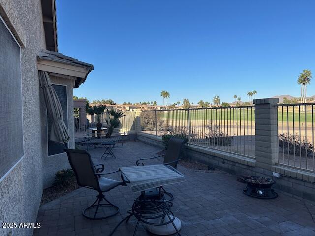 view of patio with fence