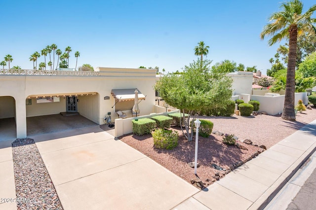 5209 N 78th St, Scottsdale, AZ 85250 - pueblo-style home with driveway