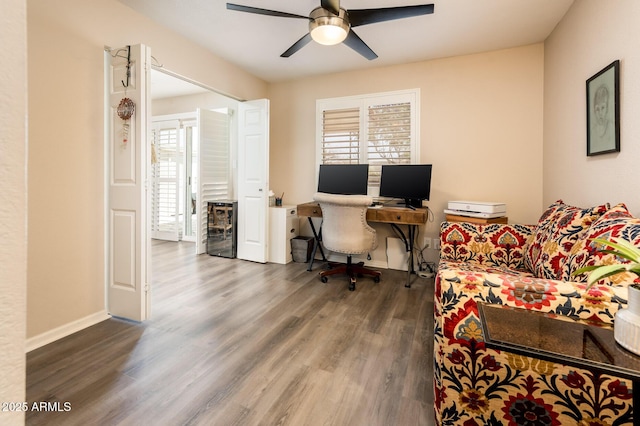 5209 N 78th St, Scottsdale, AZ 85250 - office featuring wine cooler, wood finished floors, a ceiling fan, and baseboards