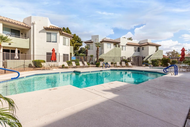 view of swimming pool featuring a patio