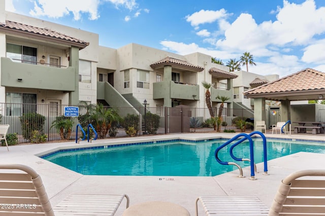 view of swimming pool featuring a gazebo