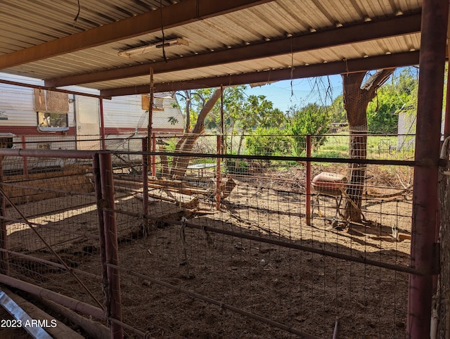 view of horse barn featuring ceiling fan