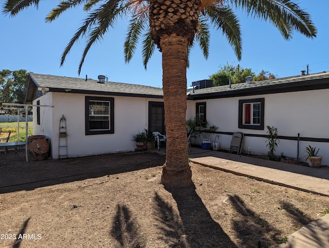 back of house featuring a patio