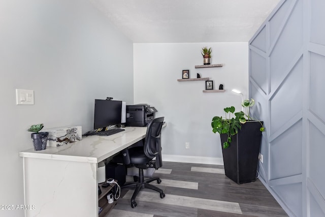 home office with dark wood-type flooring