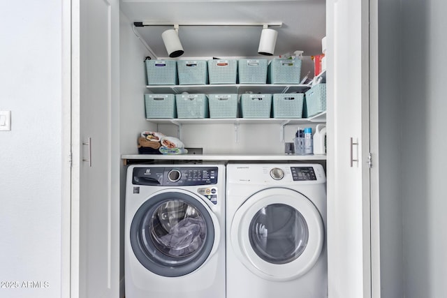 laundry area featuring independent washer and dryer