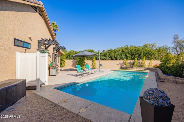 view of pool featuring a pergola