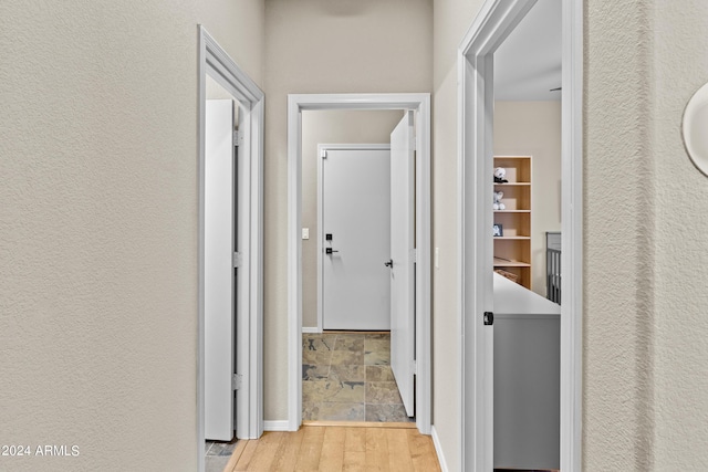 hall featuring light hardwood / wood-style flooring