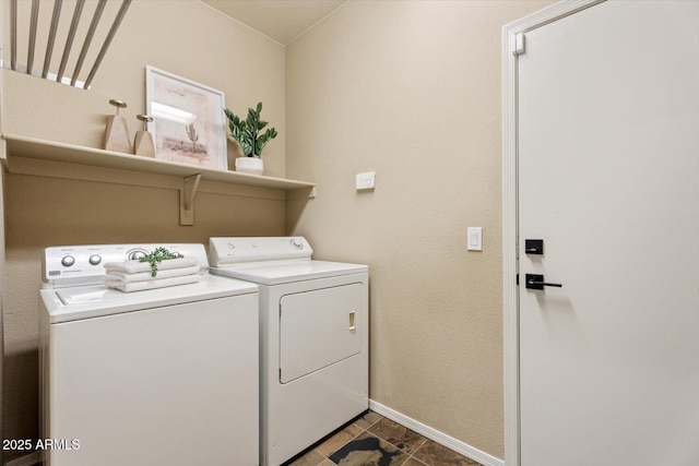 laundry area featuring washing machine and dryer