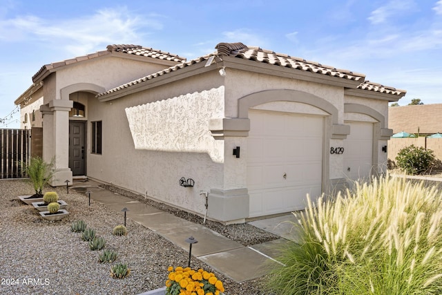 exterior space with a garage