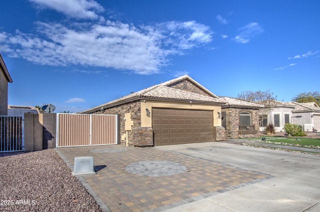 view of front of property featuring a garage