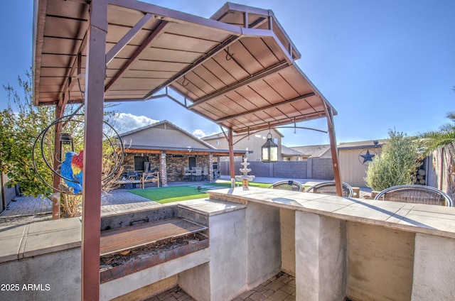 view of patio / terrace with exterior bar