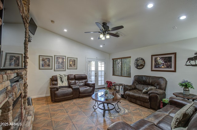 living room with lofted ceiling, ceiling fan, a fireplace, parquet floors, and french doors