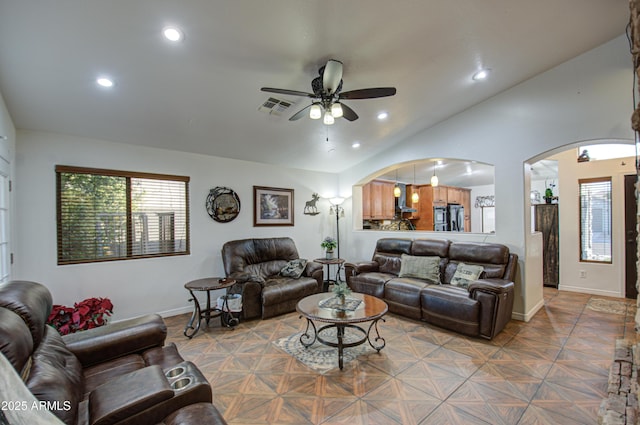 living room with vaulted ceiling, parquet floors, and ceiling fan