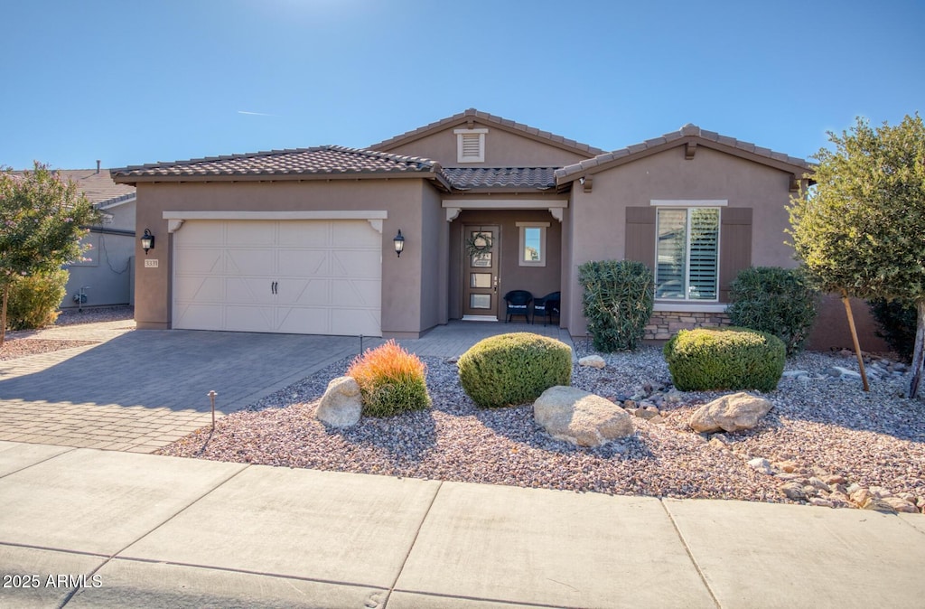 view of front of home with a garage