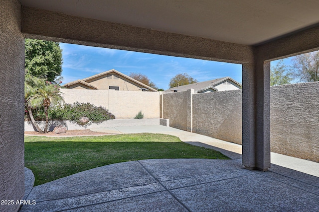 view of yard with a patio area and a fenced backyard