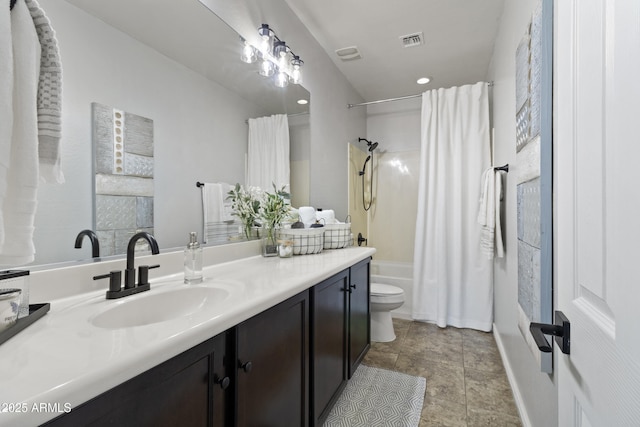 full bathroom featuring shower / tub combo, vanity, and toilet