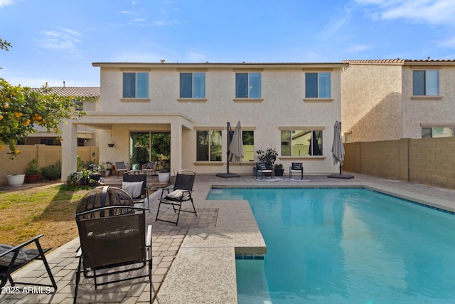 view of pool with a patio