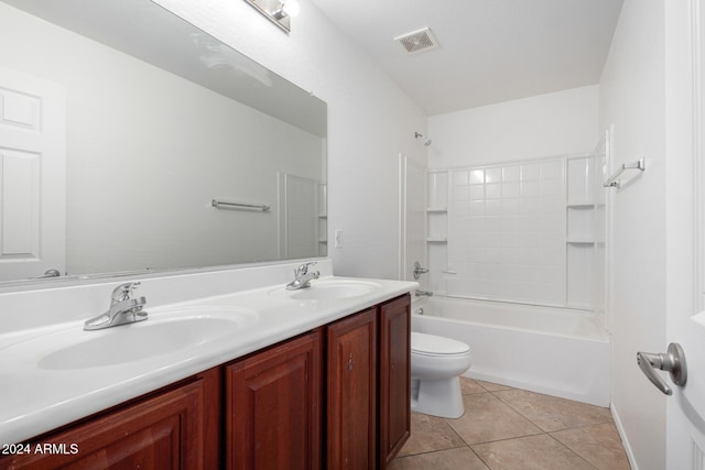 full bathroom with toilet, vanity, tile patterned floors, and shower / bathtub combination