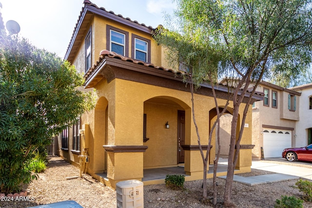 view of front of home with a garage