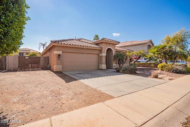 mediterranean / spanish-style home featuring a garage