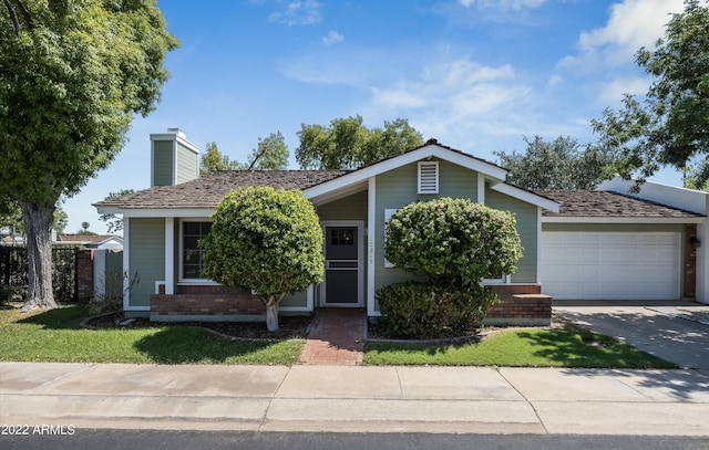 view of front of home with a garage