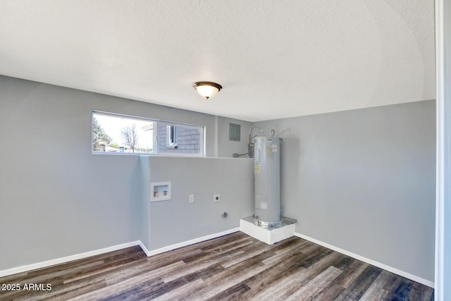 clothes washing area featuring washer hookup, dark wood finished floors, water heater, electric dryer hookup, and a textured ceiling