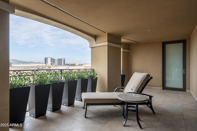 balcony featuring a mountain view