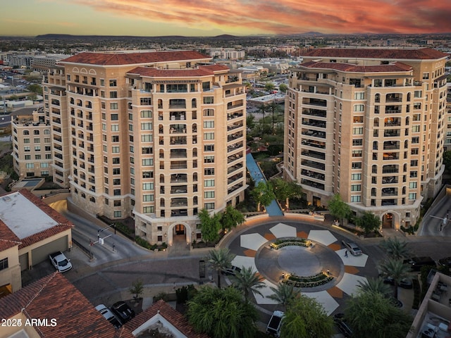 view of outdoor building at dusk