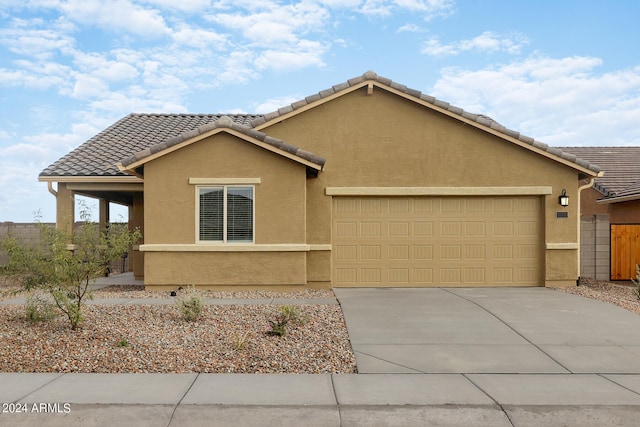 view of front of home with a garage