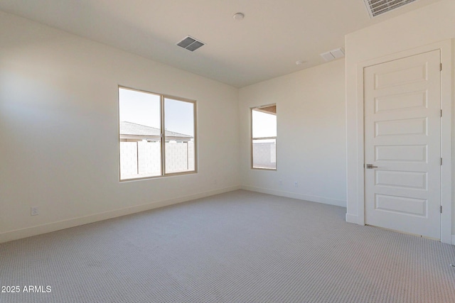 18950 W Ocotillo Rd, Waddell, AZ 85355 - empty room featuring light carpet, baseboards, and visible vents