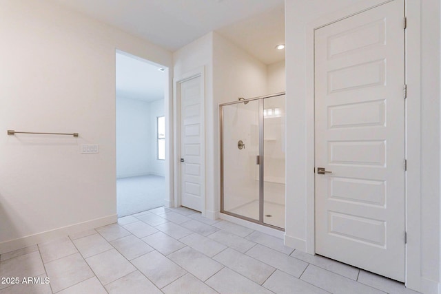 18950 W Ocotillo Rd, Waddell, AZ 85355 - bathroom with recessed lighting, baseboards, tile patterned flooring, and a stall shower